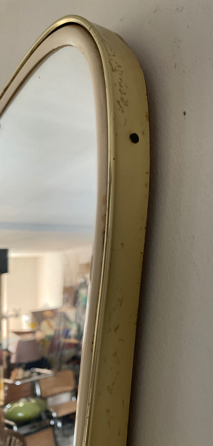 Asymmetrical mirror from the 60s freeform