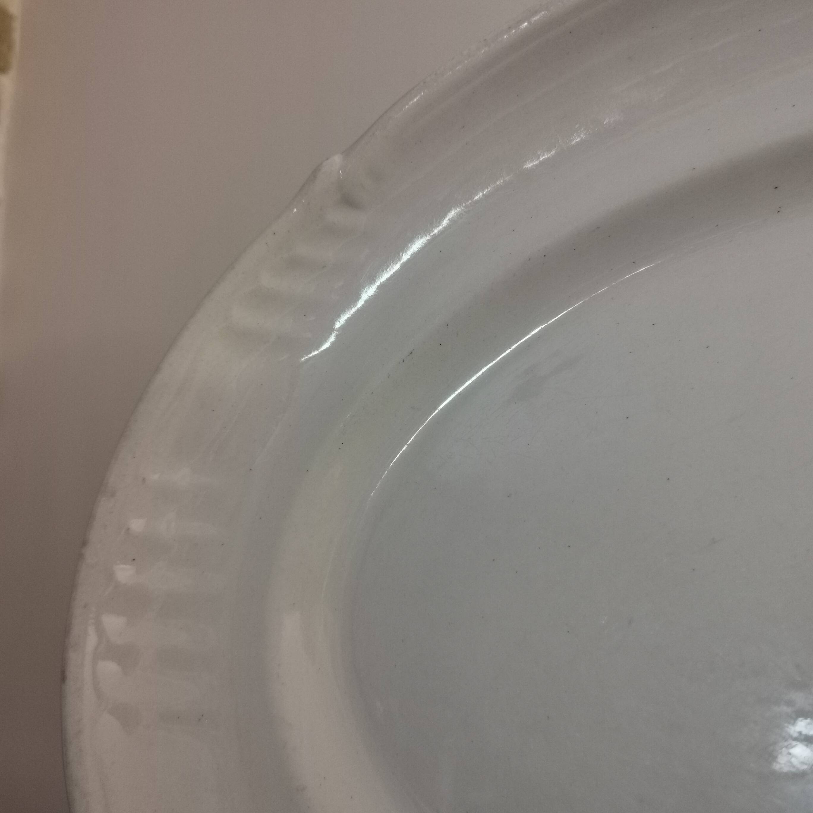 Oval white earthenware dish stamped K&G, Lunéville