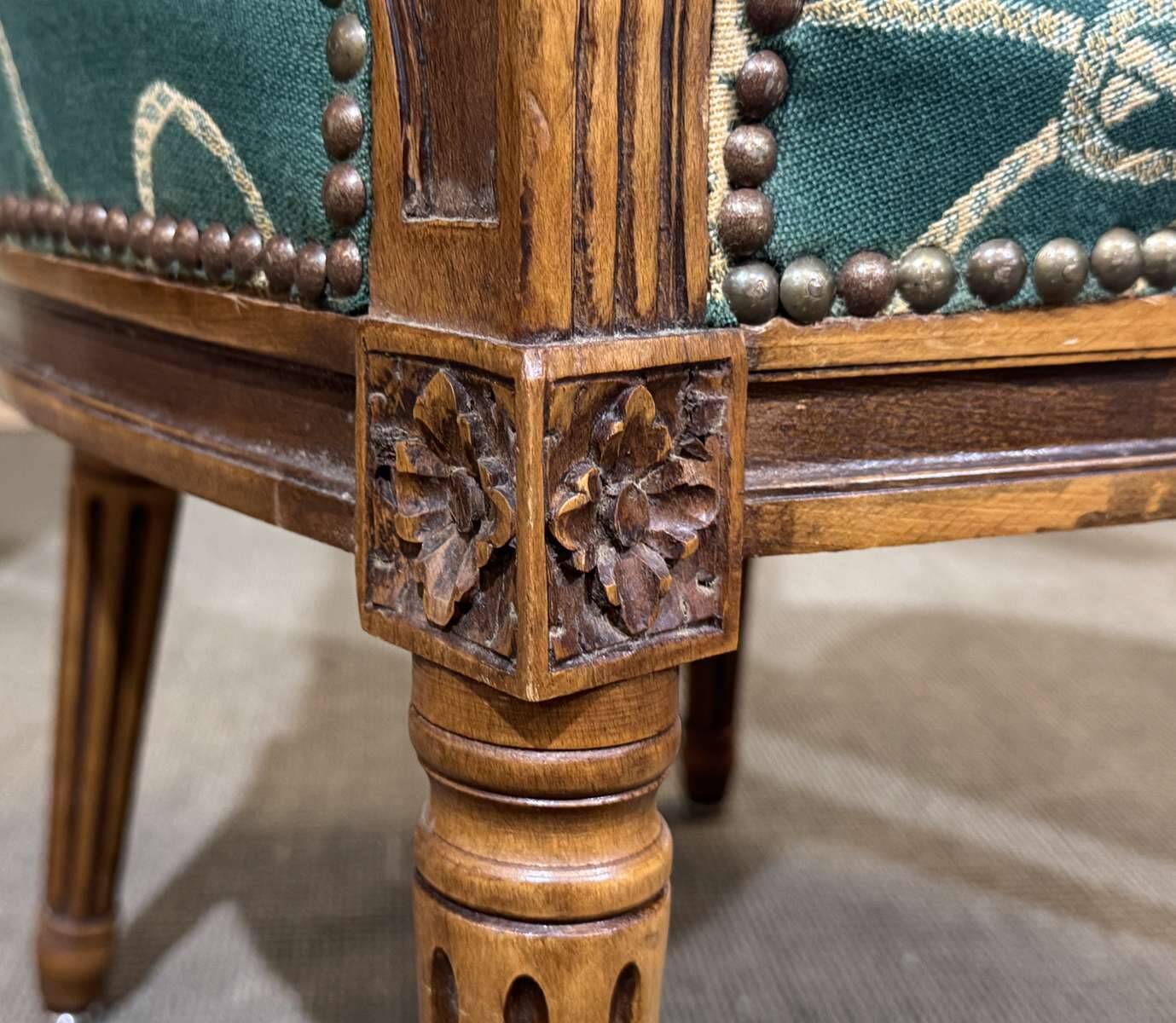 Pair of Louis XVI style armchairs in beech from the 19th century.