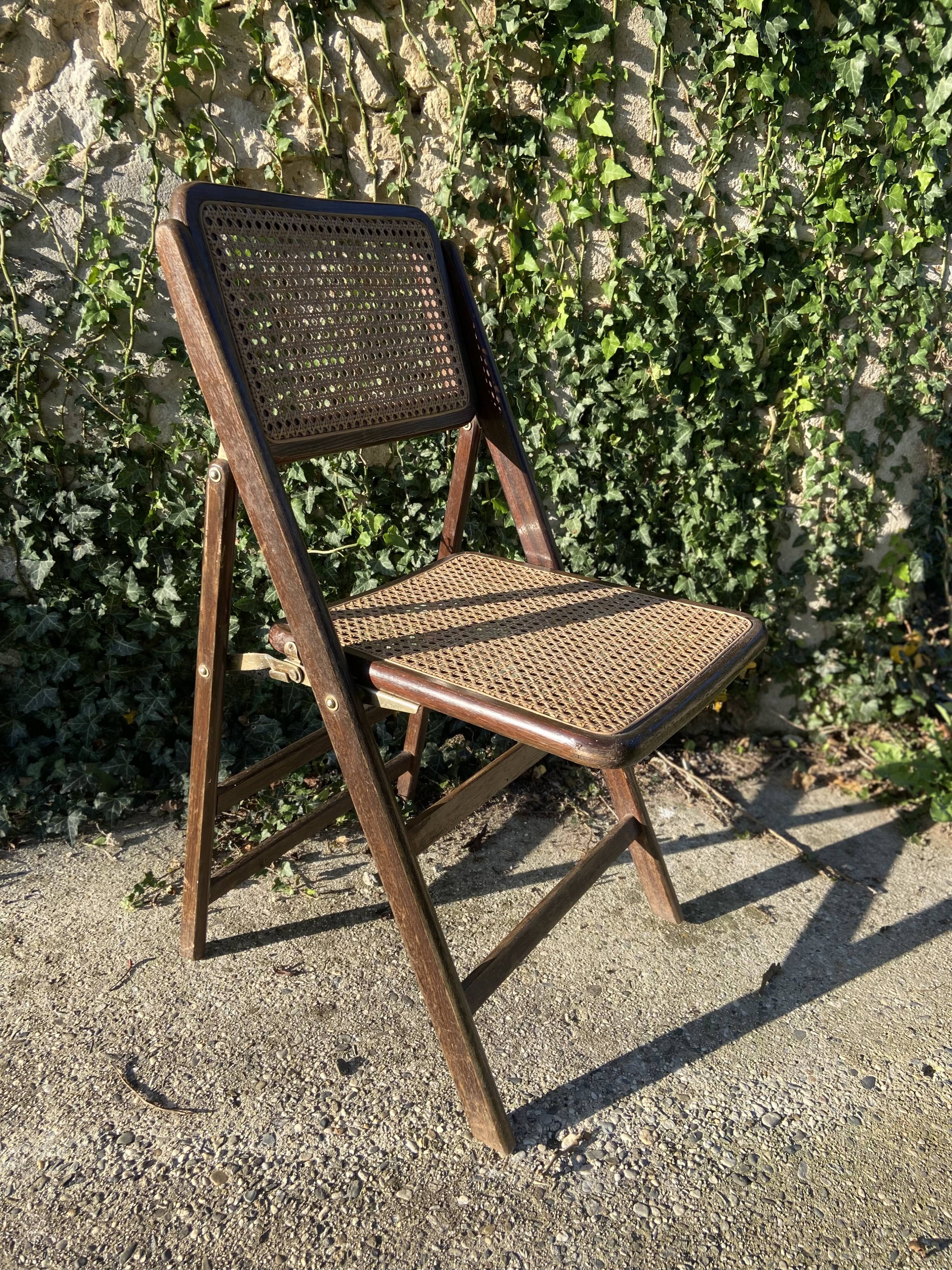 Folding chair in wood and cane.