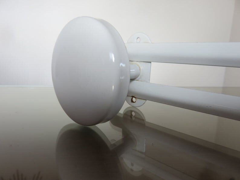 White metal coat holder in 70s