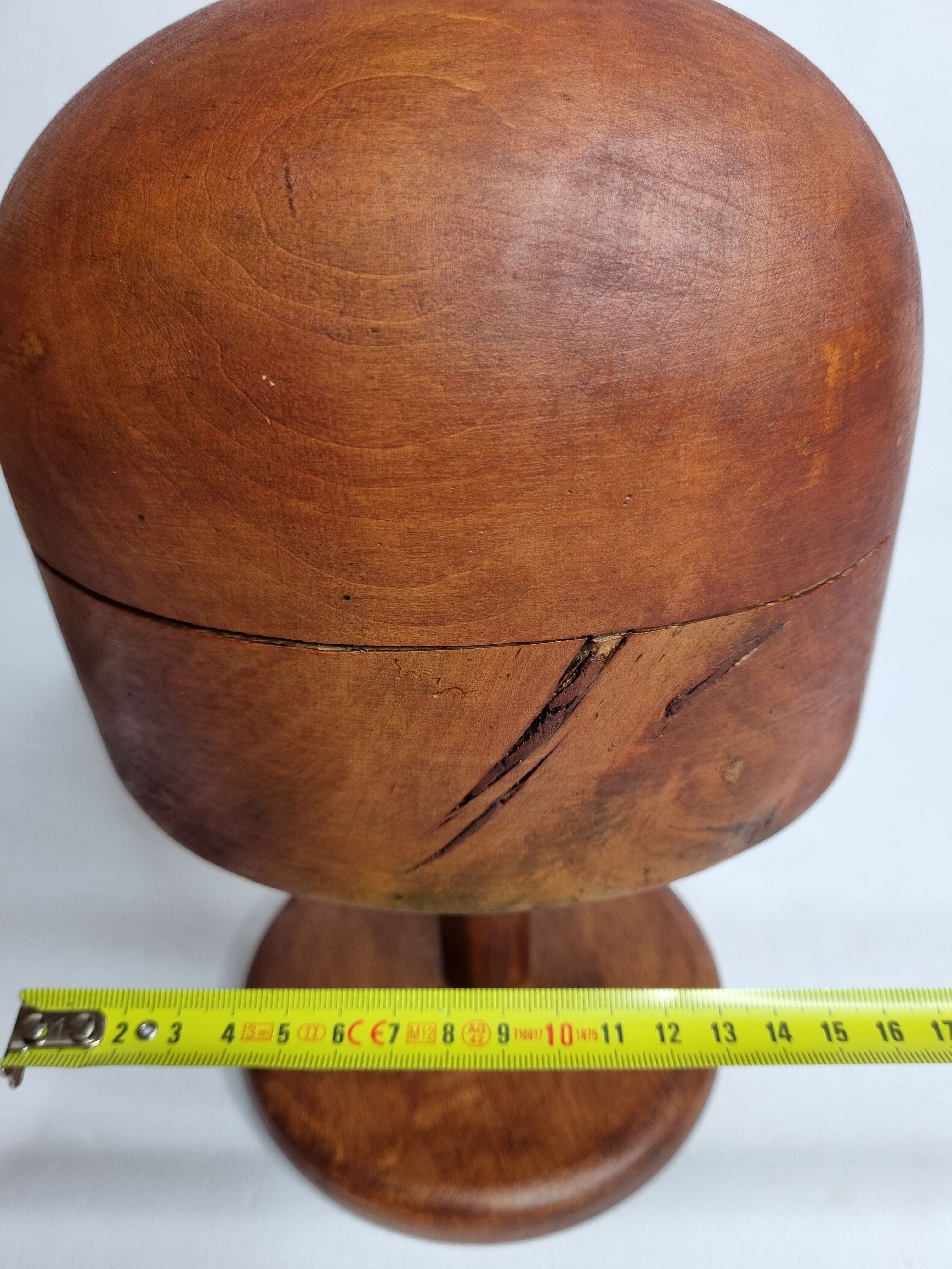 Old wooden hat shape on foot, 1900