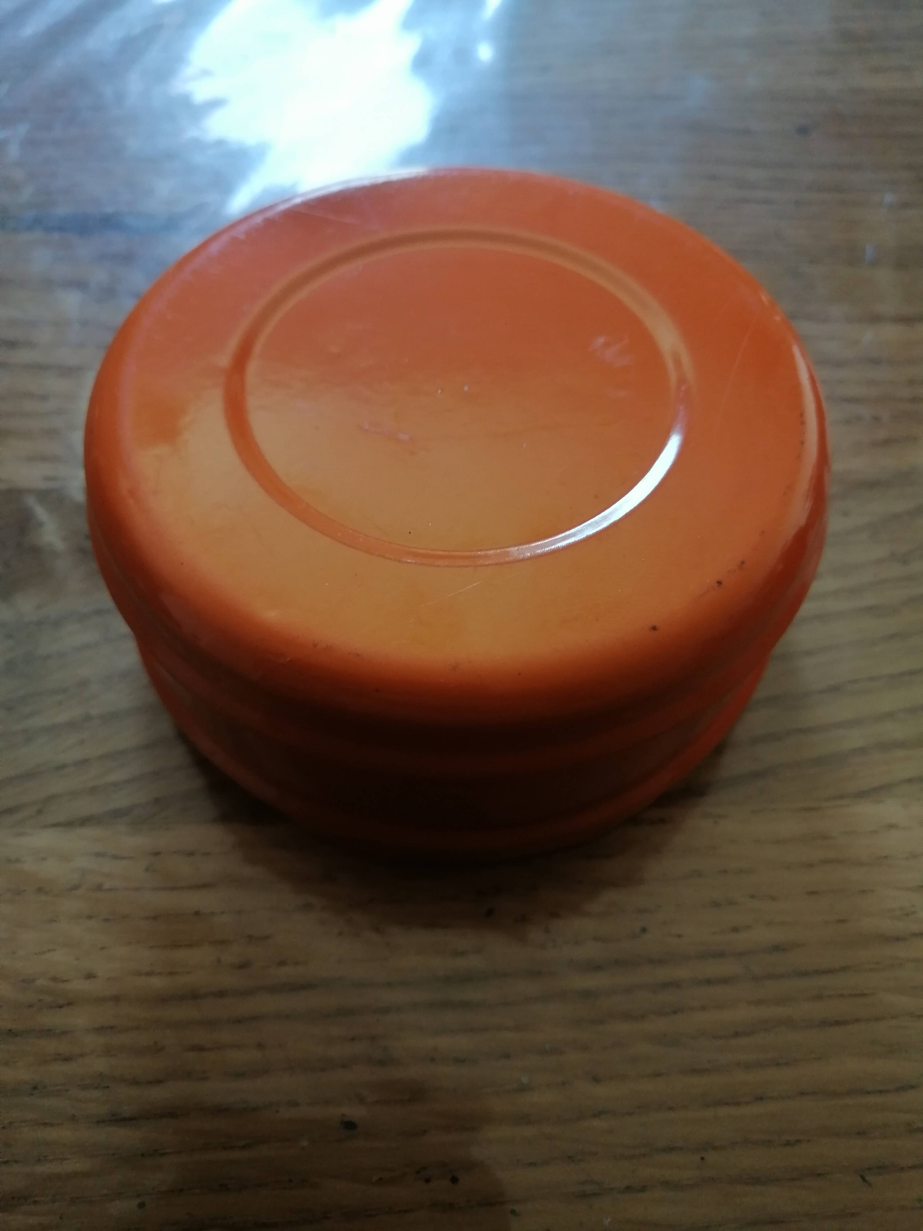 Vintage orange rotating ashtray