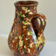 Studio ceramic pitcher with sprayed glazes – circa 1960-70