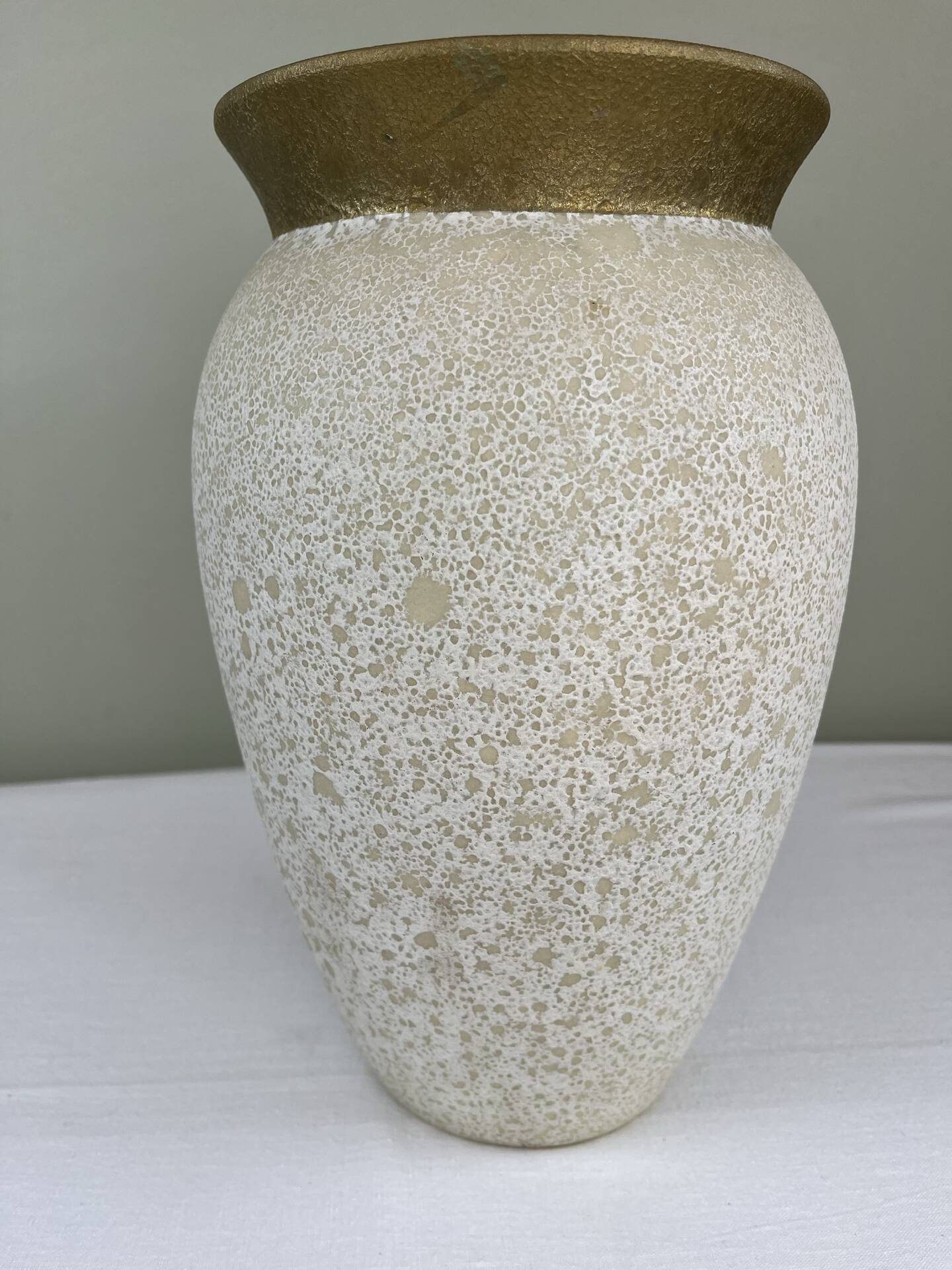 Cream speckled glazed vase with a gold rim, 1970s.