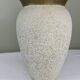 Cream speckled glazed vase with a gold rim, 1970s.