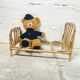 Rattan doll bed