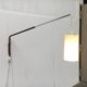 Mid-century German minimalist wall lamp with cantilever arm by Erco.