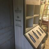 Store display for whisky and rum in metal and melamine