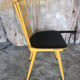 Baumann western style chair in yellow wood + vintage black skai seat