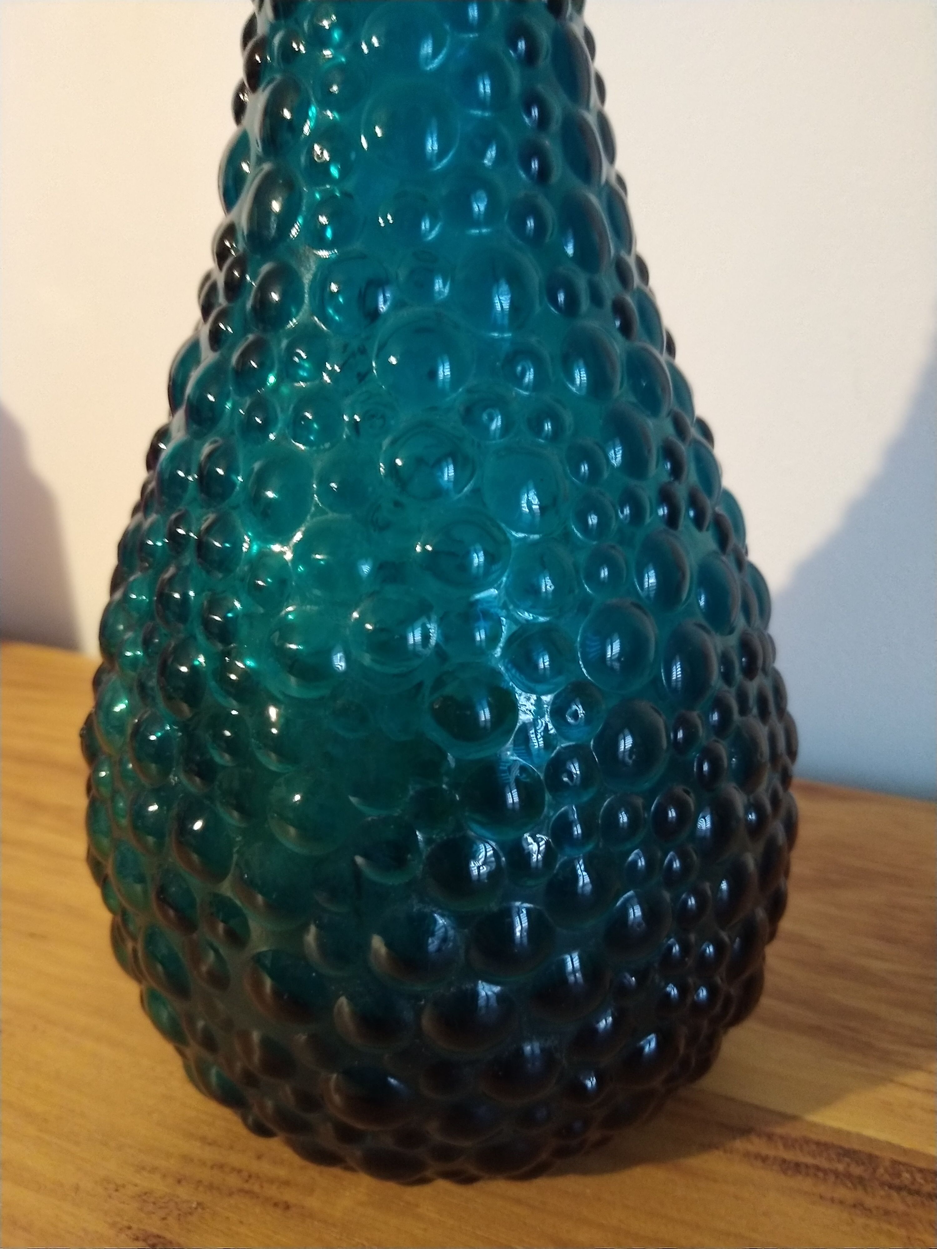 bottle made of blue vintage molded glass