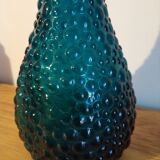 bottle made of blue vintage molded glass