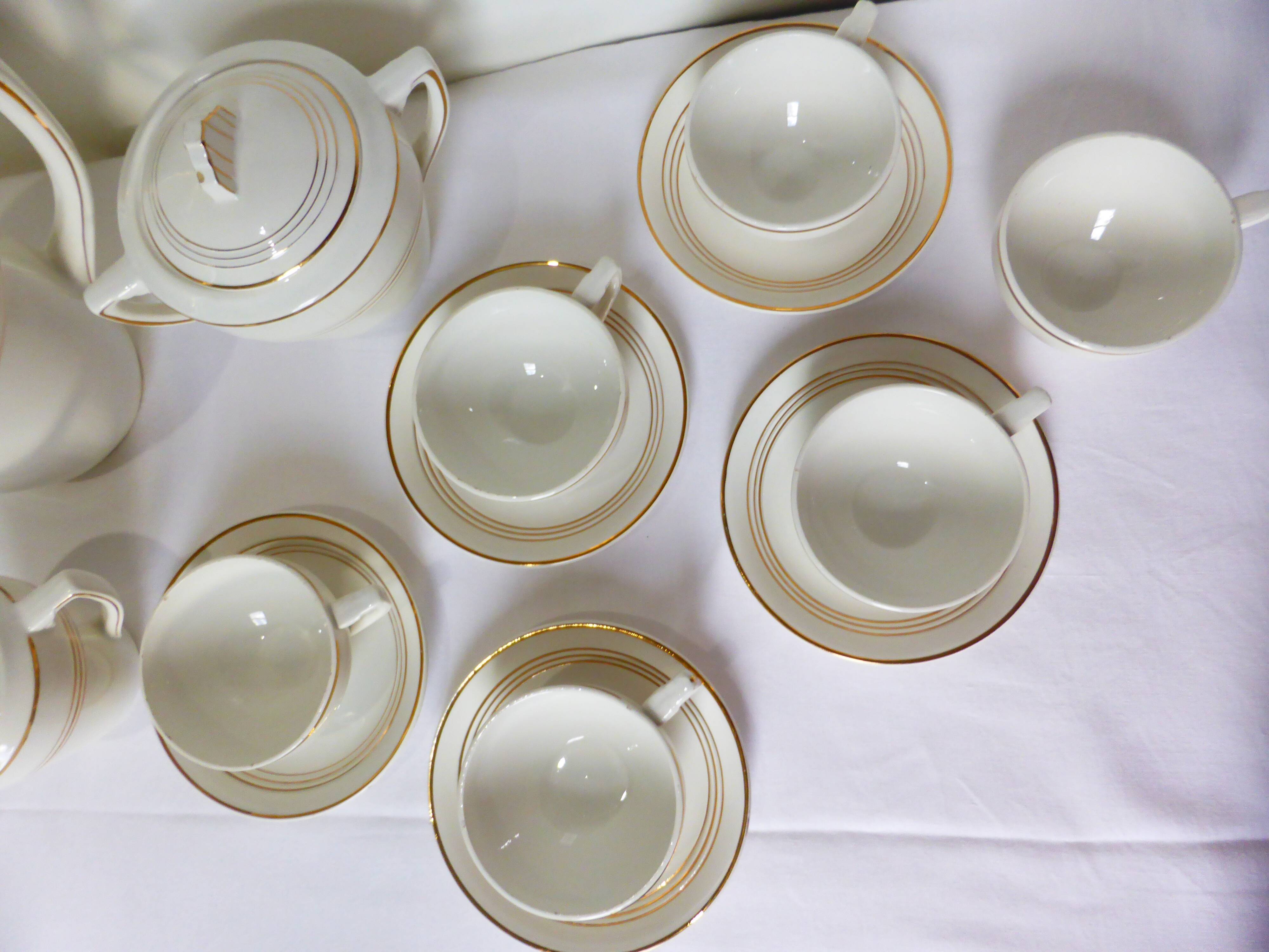 Céranord coffee service with gold trim 220574