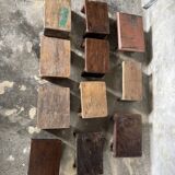 Small auxiliary stool in upcycled teak with traces of green chrome on the leg.