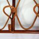 Vintage wall coat rack in bamboo and rattan.