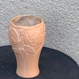 Terracotta vase with a vintage ceramic relief rose pattern