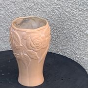 Terracotta vase with a vintage ceramic relief rose pattern