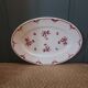 Oval dish with red floral decoration from the 40s