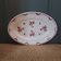 Plat ovale à décor floral rouge 40's
