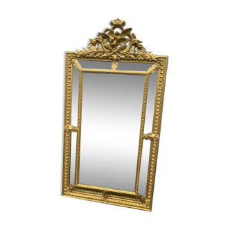 Very large gold beaded mirror with pediment