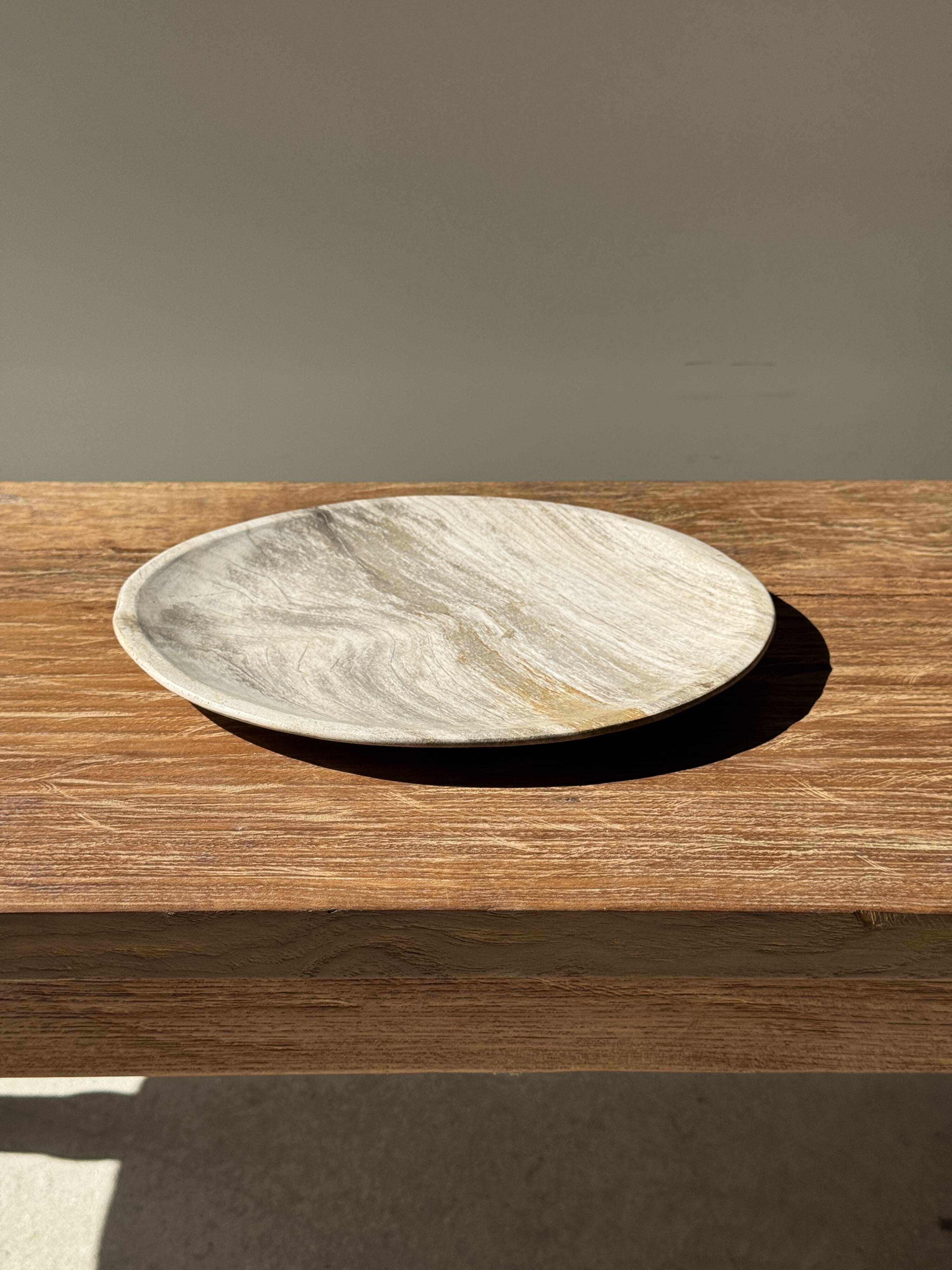 Petrified wood vide poche, circular dish or plate in light beige D25.