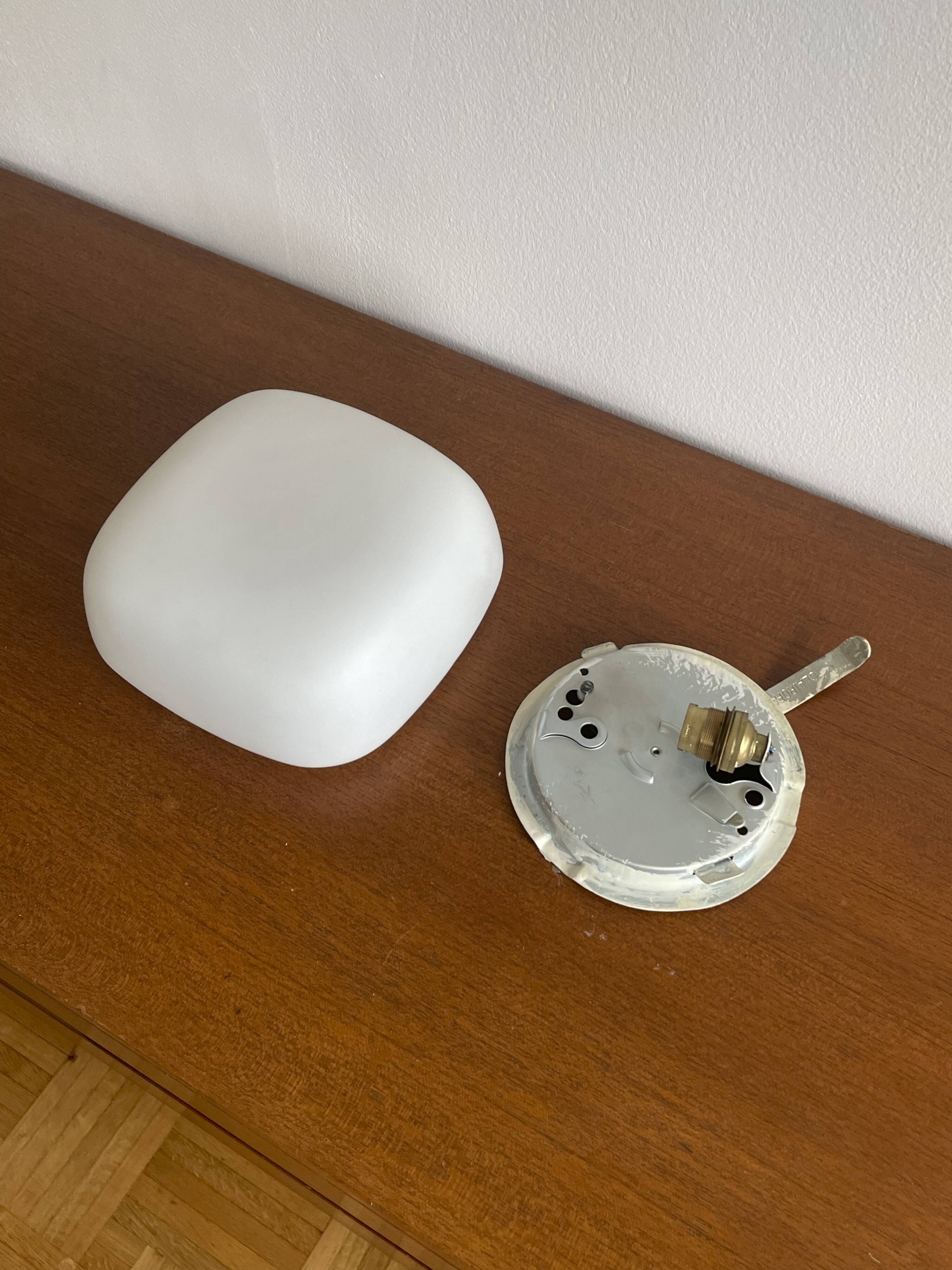 Square wall lights in sandblasted white glass