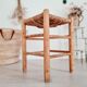 Old stool in wood and straw brutalist look