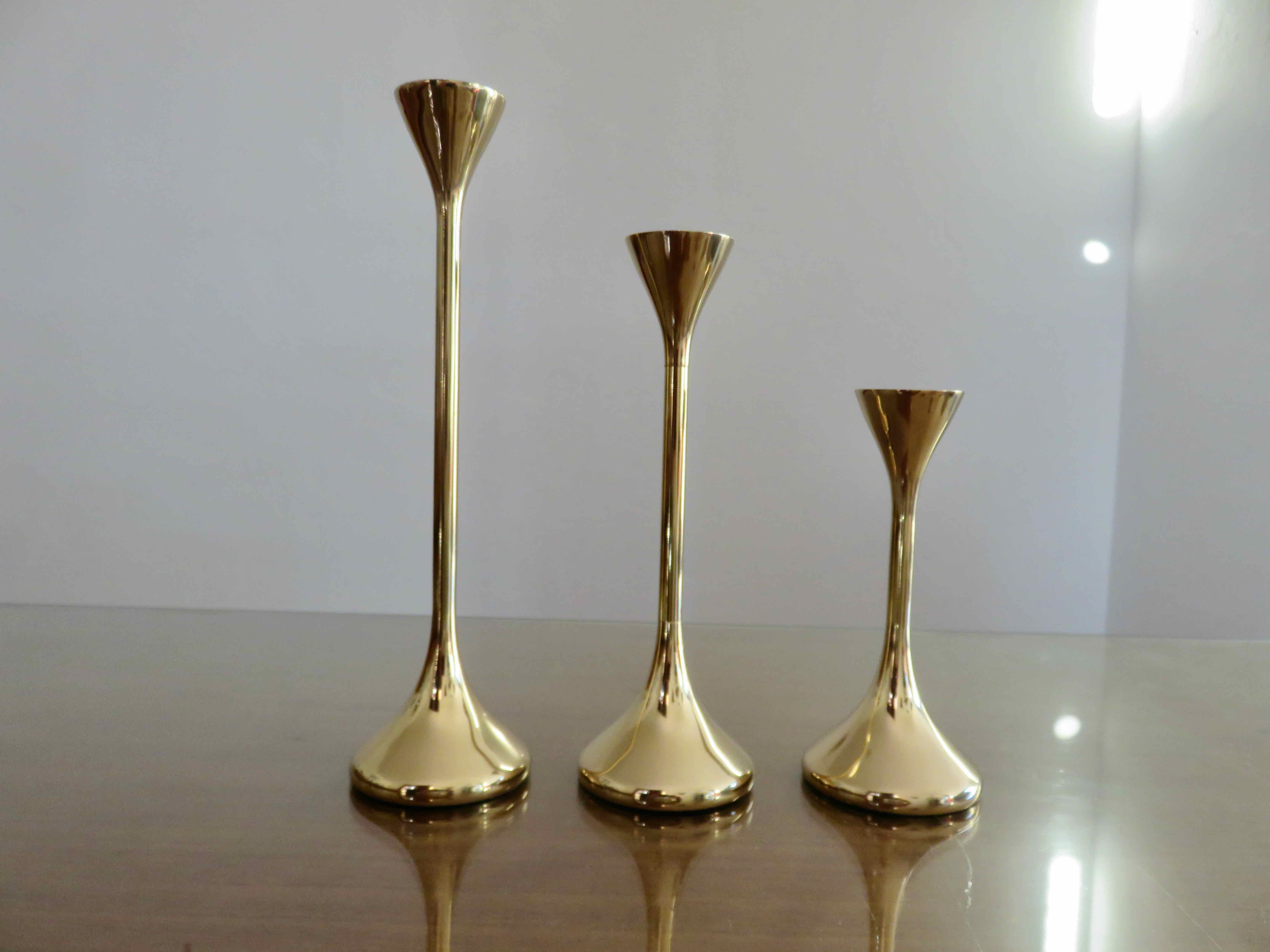 Series of 3 Scandinavian brass candle holders, 70s tulip foot