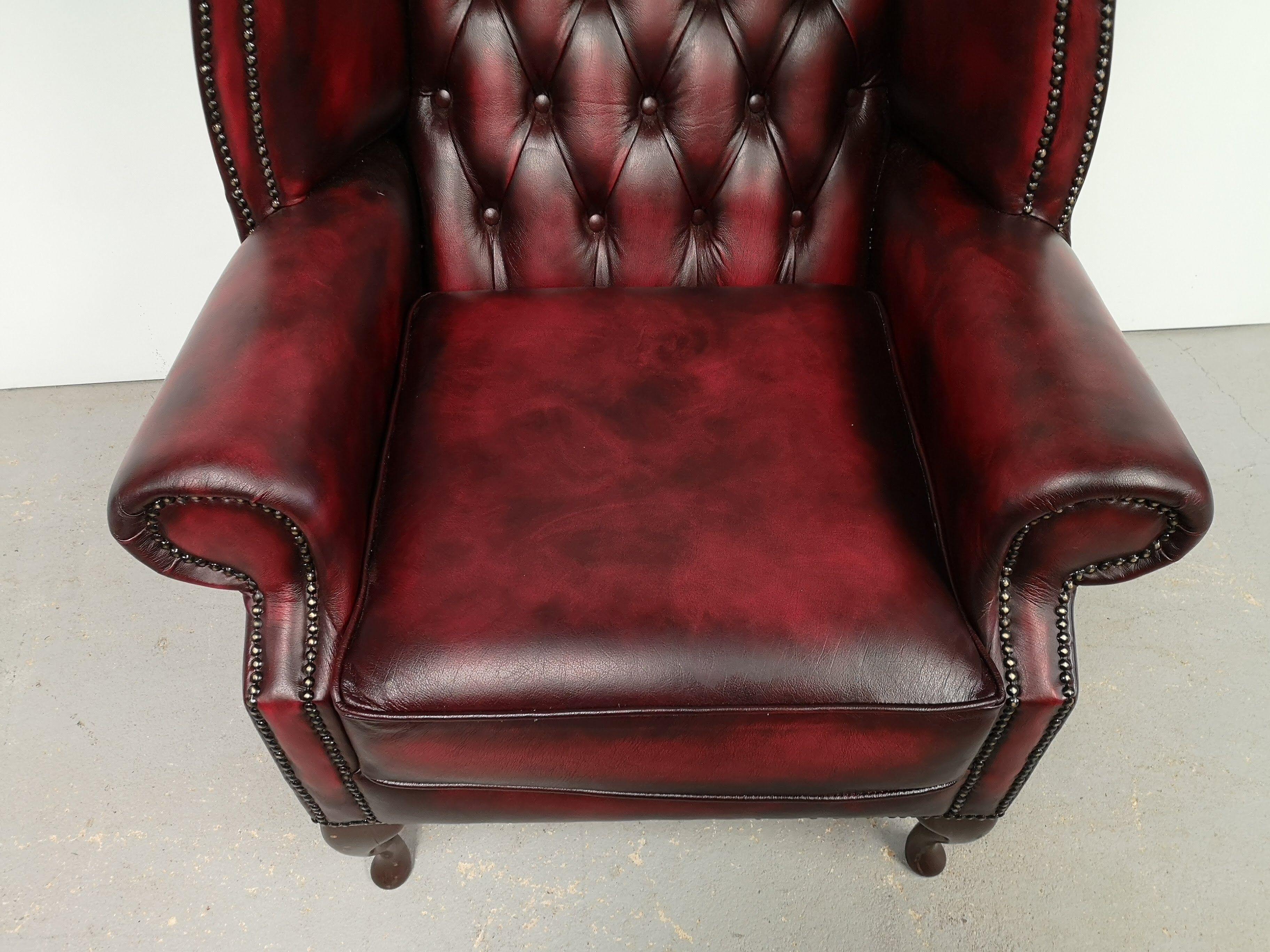 Burgundy chesterfield chair