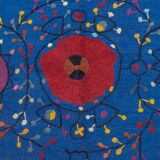 Midnight blue suzani kilim rug with embroidered patterns