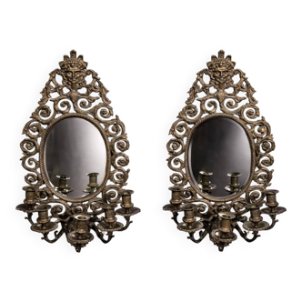 Pair of antique wall mirrors in bronze – baroque style, with integrated candle holders.