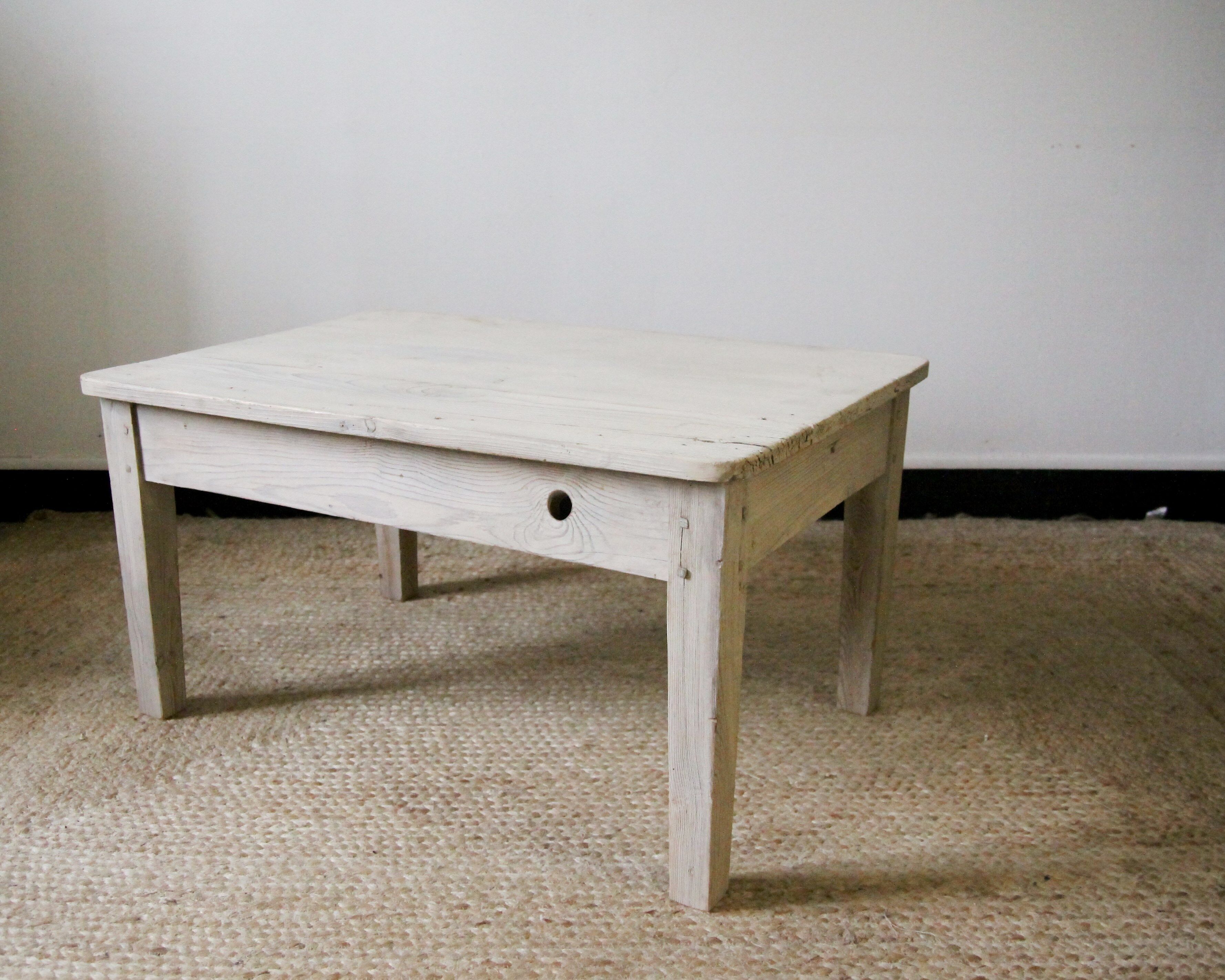 White lacquered coffee table