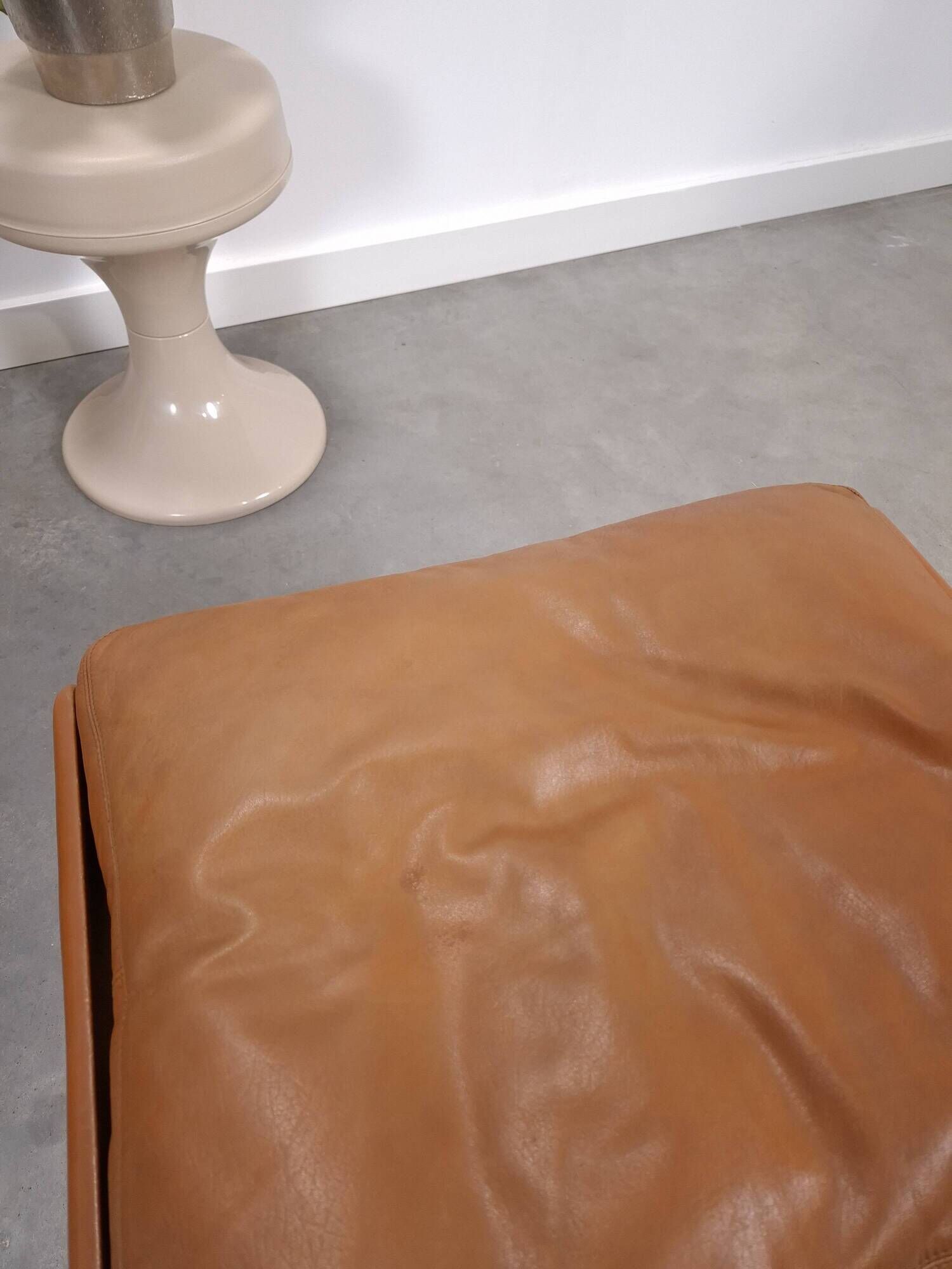 Vintage COR Swing armchair with ottoman, Reinhold Adolf, cognac leather
