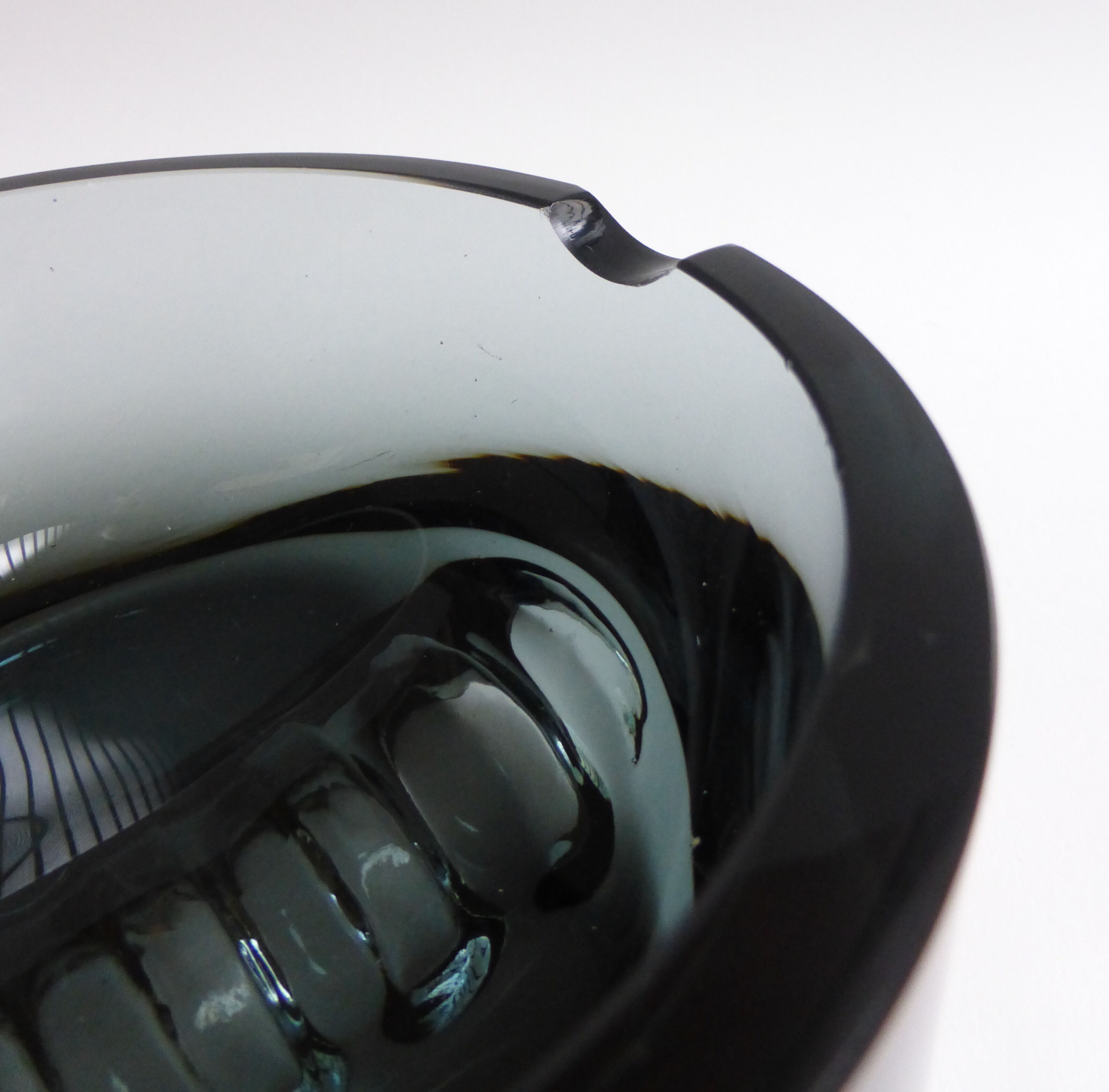Scandinavian ashtray in 1970's moulded smoked glass