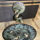 Empire style bronze candlestick with a candle holder