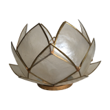 Candlestick or candle holder in nacre flower shape