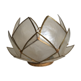 Candlestick or candle holder in nacre flower shape