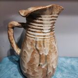 Pitcher signed Eugène Lion