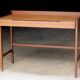 Succession LACOSTE: Scandinavian teak desk hairdresser (1960s).