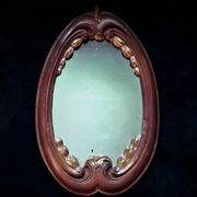 Mirror carved in oak with golden laurel leaves - early 19th century