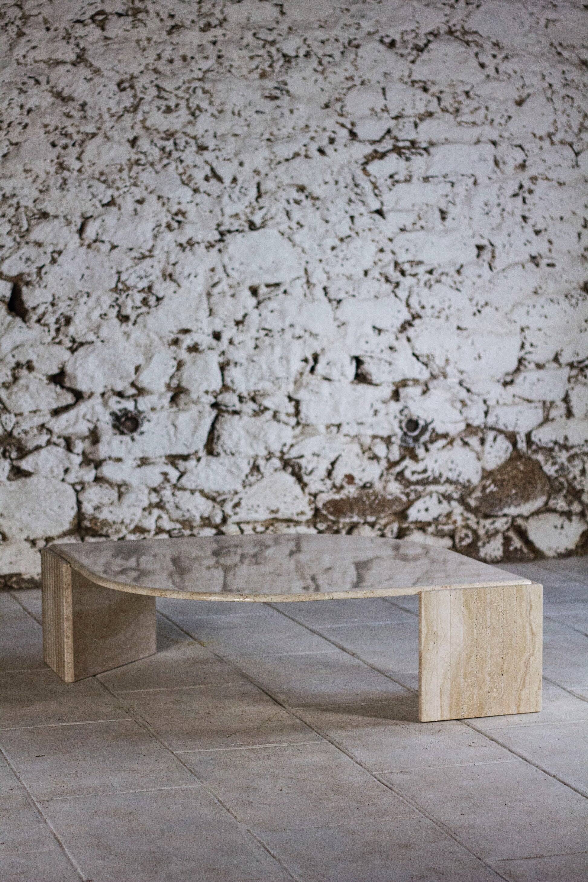 Travertine coffee table "Eye" or "drop" by Roche Bobois, 1980