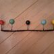 Wrought iron coat rack and wooden balls 5 hooks