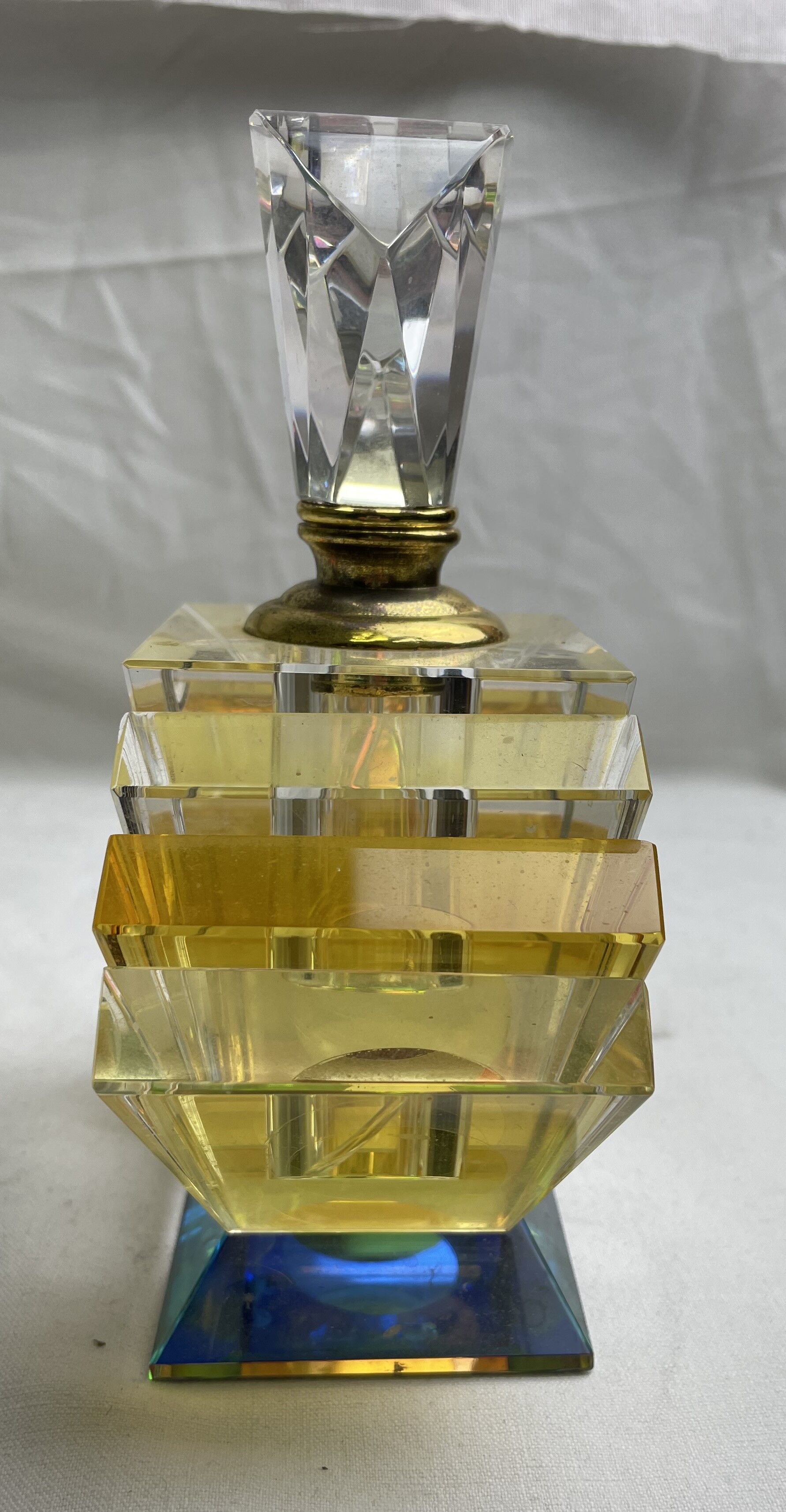Empty art deco perfume bottle in amber crystal