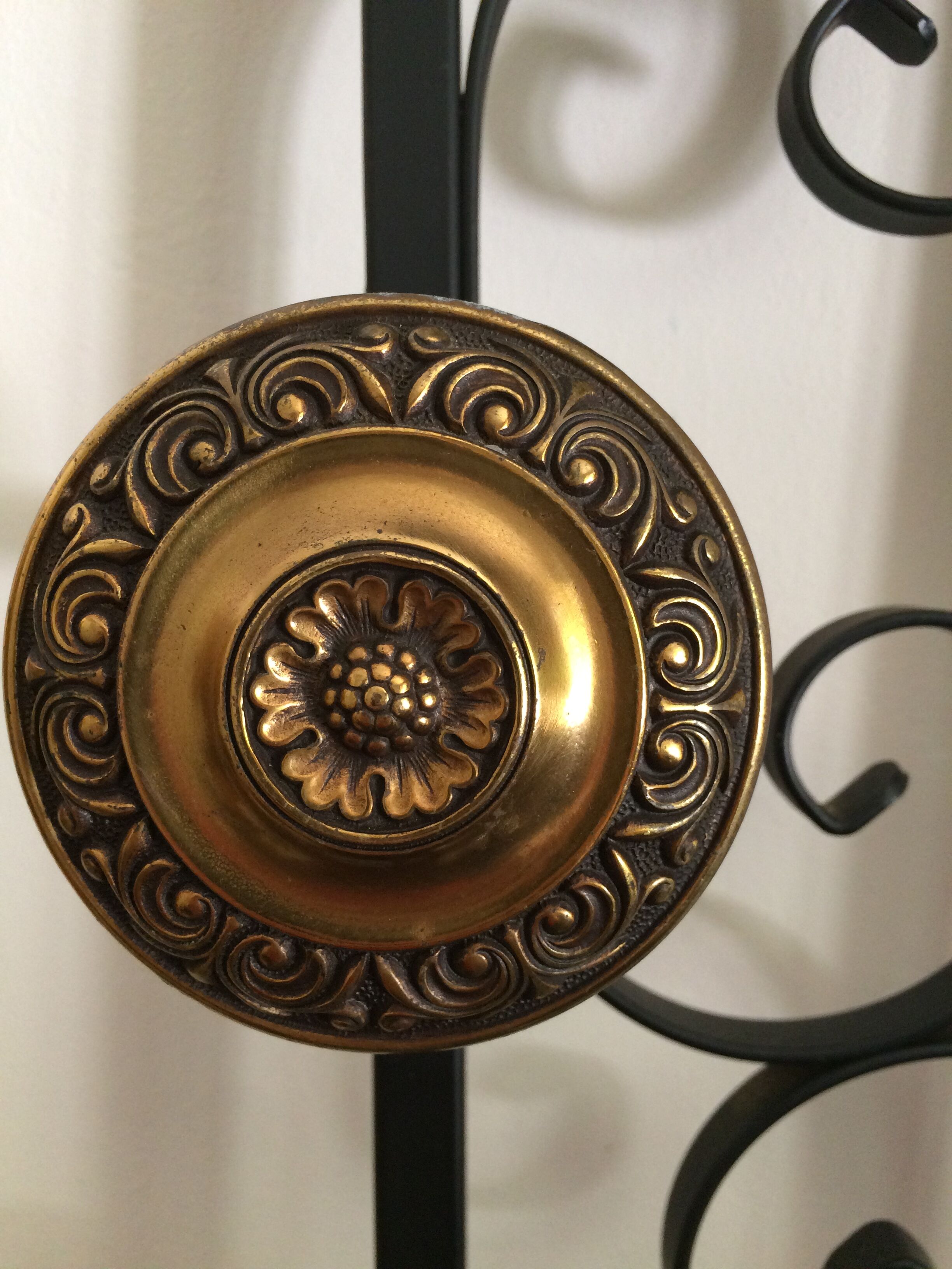 Coat hanger on wrought iron feet