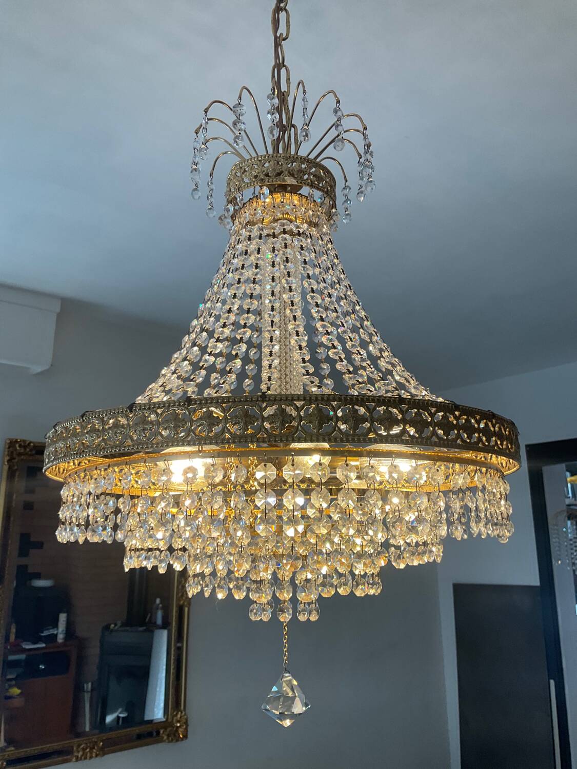 Brass hot air balloon chandelier with cascade of tassels
