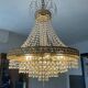 Brass hot air balloon chandelier with cascade of tassels