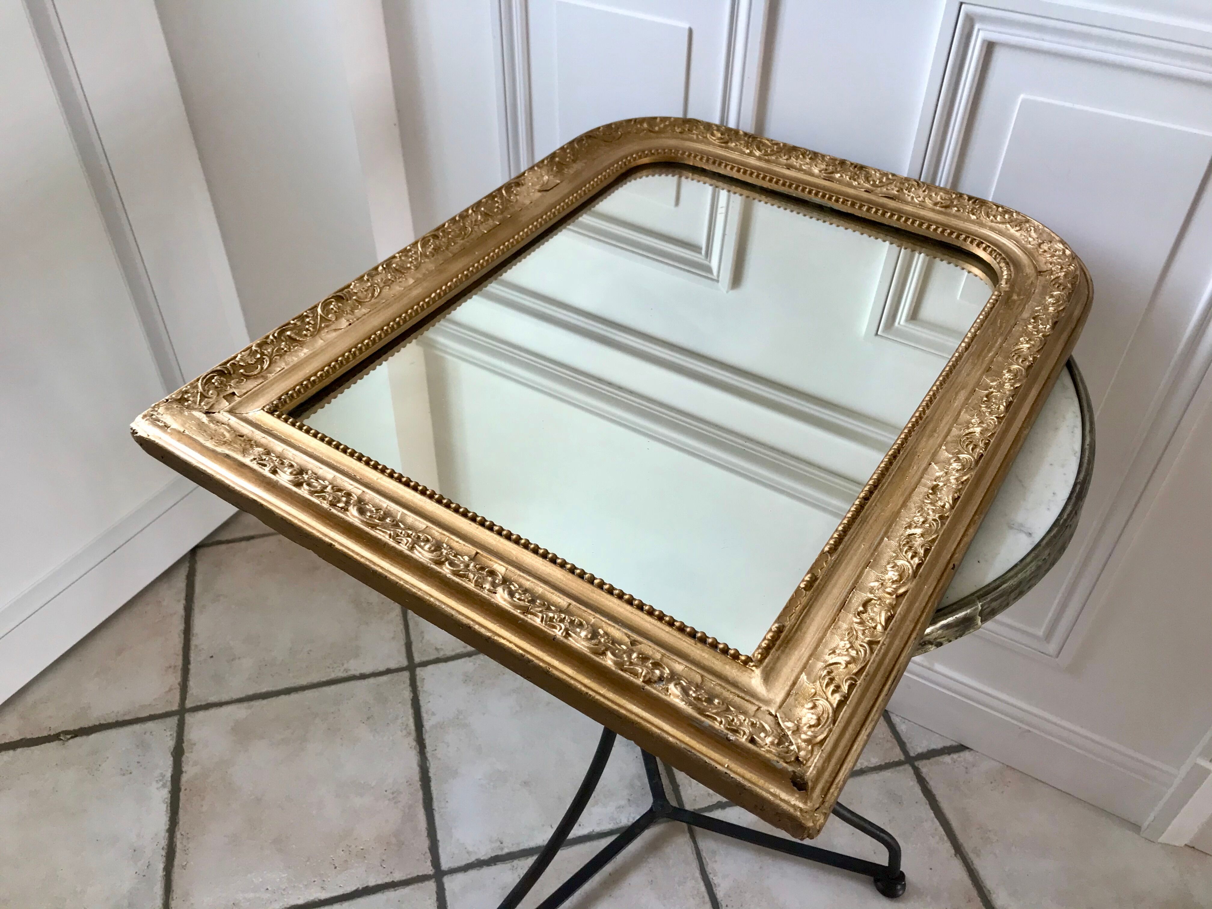 Wooden mirror and gilded stucco early twentieth century