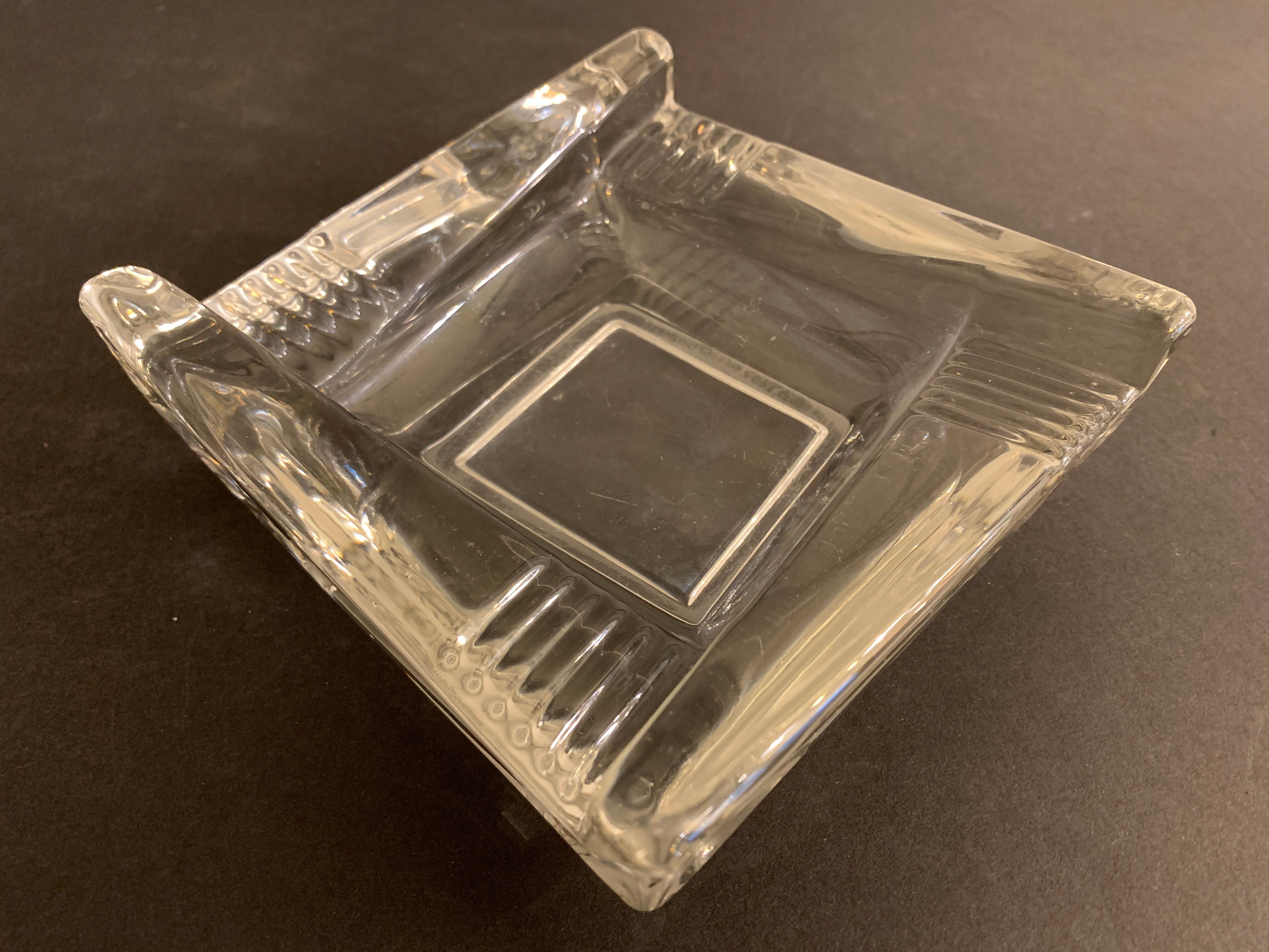 Transparent moulded glass ashtray