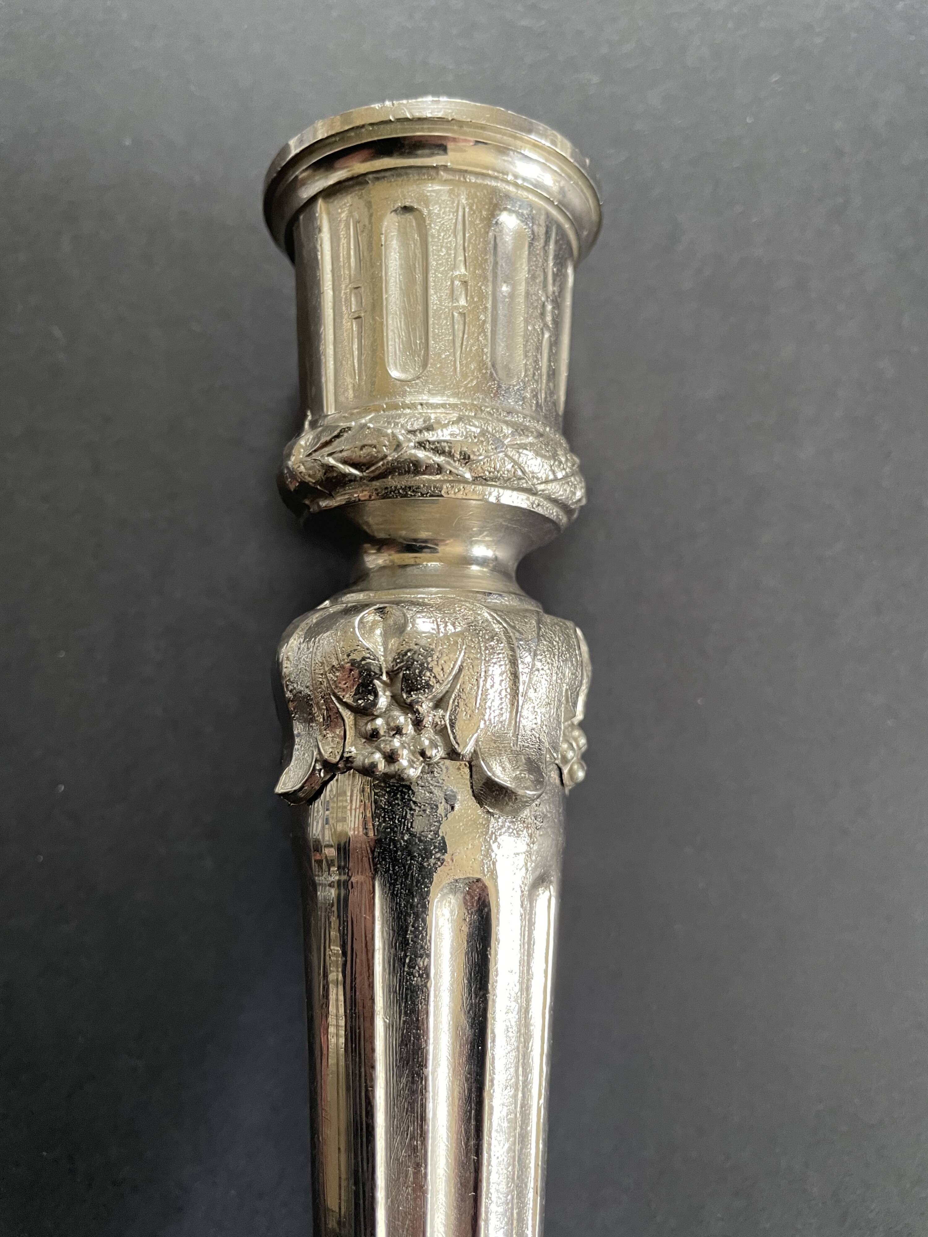 Antique silver-plated candlesticks in classic style