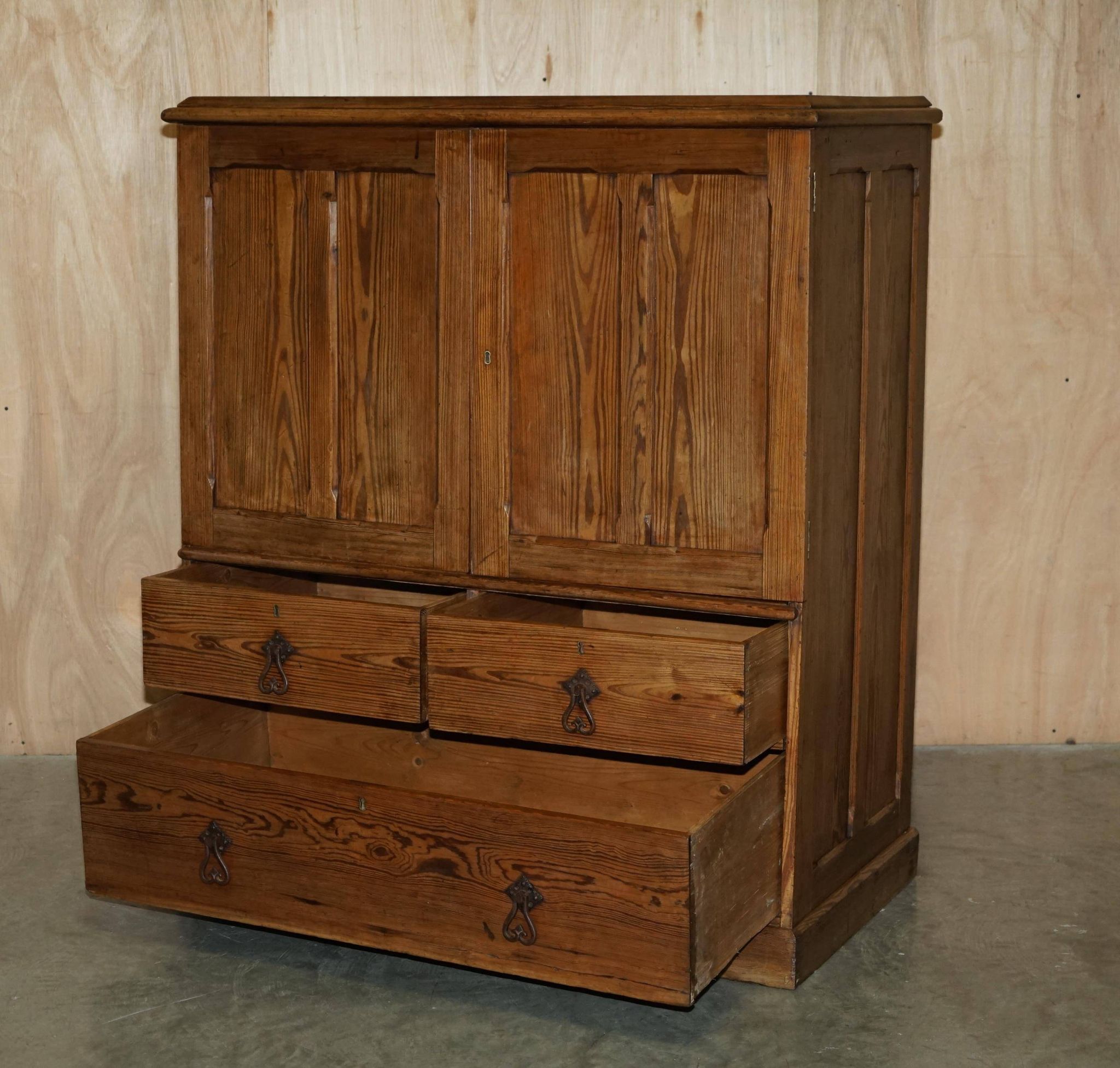 Antique Victorian pine governess buffet with sliding shelf.